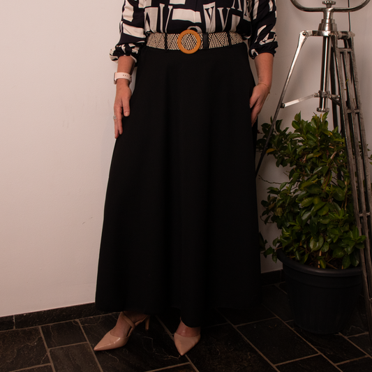 Zwarte klokmodel rok met rieten riem